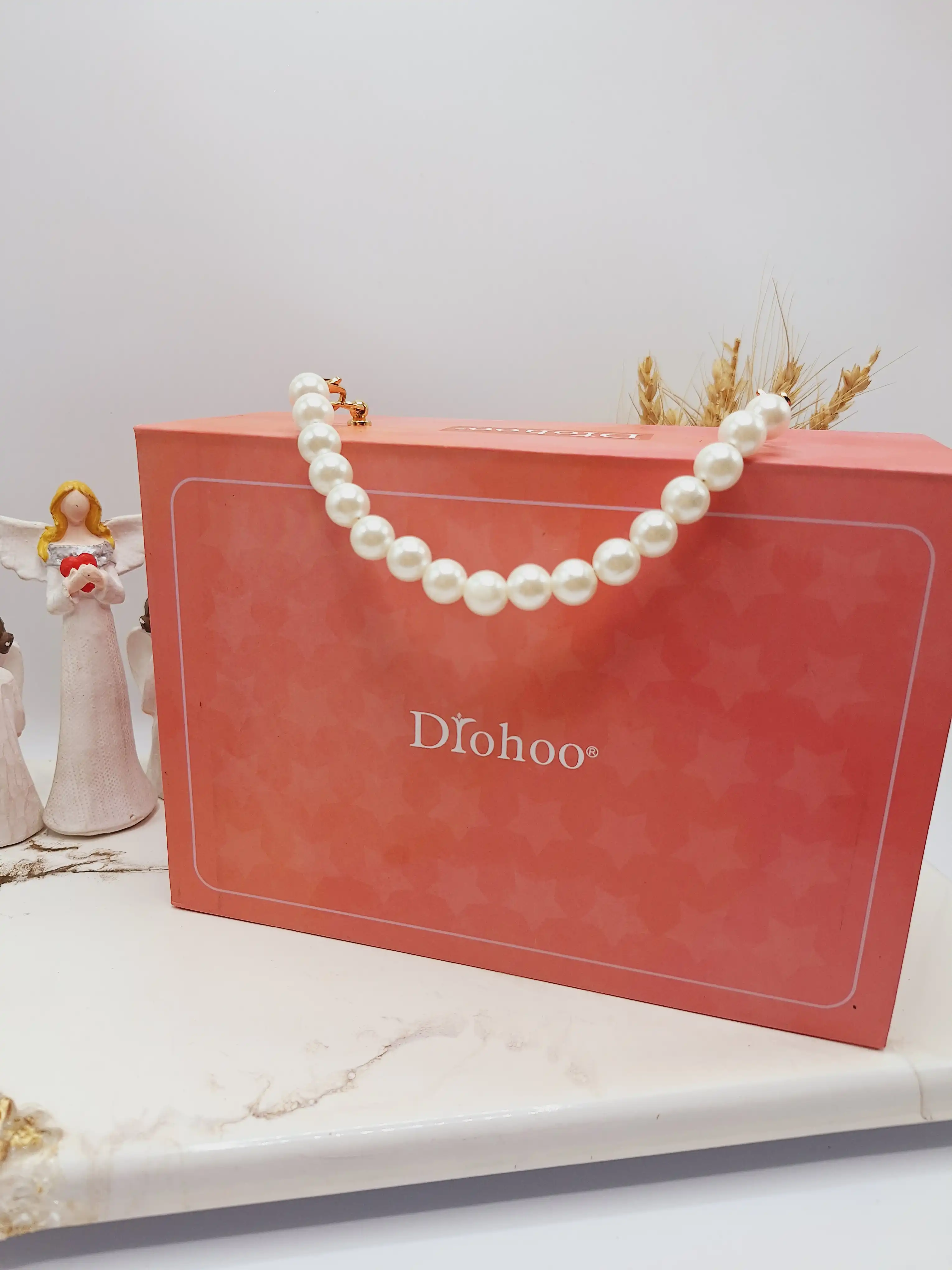 پک رژ 24 تایی مدل کیف زنانه رنگ نود برند دروهو Drohoo کدZY23087